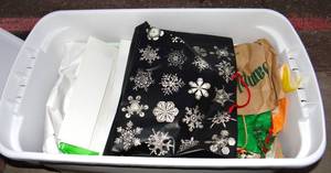 lot 360 image: LARGE STERLITE CARRY TOTE FULL OF HOLIDAY BAGS & BOXES