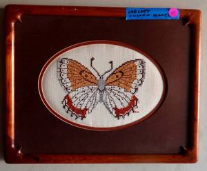 lot 44 image: Beautiful Needlepoint Butterfly - Matted in Custom Wood Frame