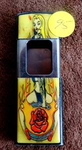 lot 95 image: Unique Pill Case - Noveltyinc (2006) with tattoo art on outer case