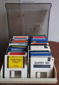 lot 102 image: Assorted Lot of VHS Tapes and old computer software