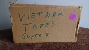 lot 104 image: Box of Super 8 Tapes - Marked Vietnam (war era) also one with Japan and Ireland. Another has USO