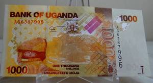 lot 2 image: RARE - Bank of Uganda 1000 Shillings Shilingi 2010 - UNCIRCULATED EPQ P-49a (possible 64)