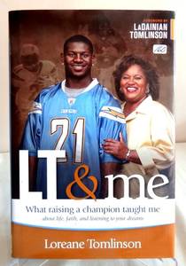 lot 160 image: AUTOGRAPHED - Signed LT and Me (Loreane Tomlinson)  What Raising a Champion Taught Me about Life, Faith, and Listening to Your Dreams ($75.00)