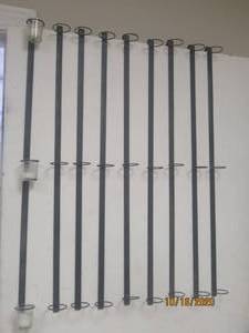 lot 784 image: TOTAL OF 9 WROUGHT IRON OVER THE DOOR 3 CANDLE VOTIVE HOLDER&nbsp