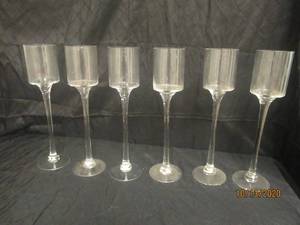 lot 748 image: &nbspTOTAL OF 6 STEMMED GLASS CANDLEVOTIVE HOLDER&nbsp 18 H&nbsp FEATURES A TIMELESS CYLINDER SHAPE ATOP A LONG STEM AND A CIRCULAR BASE&nbsp