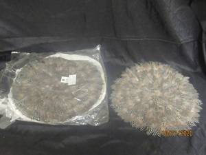 lot 885 image: TOTAL OF 10 MURVAL 33126N GUINEA FEATHER PLACEMATS&nbsp 16 DIAM FELT BOTTOM&nbsp