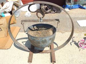 lot 4 image: Cast Iron Pot ON HANGER RING - RING  48 and pot 22
