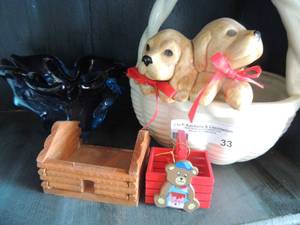 lot 33 image: Red teddy bear, traverse bay woolen toy, purple and blue glass candy bowl, Brenham Texas sunspot with2 puppies