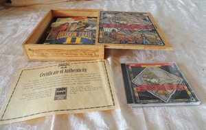 lot 50 image: Oregon TRAIL 2,  guide. Map, book, DVD  NEW
