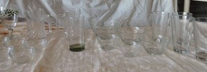 lot 52 image: Misc. glass dish lot- 6 small dip bowls, 2 beer mugs, 4 tea glasses and set of bubble glass bowls x 5