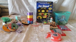 lot 53 image: Christmas lot- ribbon, ornament hooks, tape, lights, Star Shower Laser light NEW