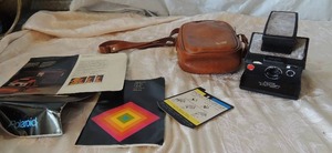 lot 65 image: Vintage polaroid SX-70 land camera Alpha1 model 2 in carry case original paperwork