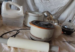 lot 74 image: Kitchen lot- rolling pin, mini rival Crockett slow cooker, Hamilton beach mixer, mini egg holder lamb jello mold