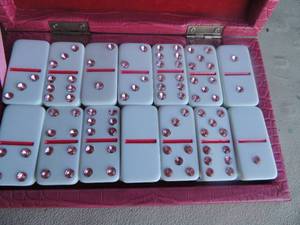 lot 108 image: Bedazzeled pink set in box domines unique