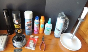 lot 81 image: Paper towel holder, world pool replacement filter cutter bug spray wasp spray wall plug and more
