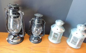 lot 85 image: 2 black citronella oil burning lanterns 2 silver hanging candle lanterns