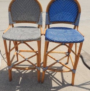lot 41 image: 2 Wicker chairs BAR HEIGHT   ONE HAS Blue seat  & ONE HAS A GREY SEAT  45x20  GREAT CONDITION