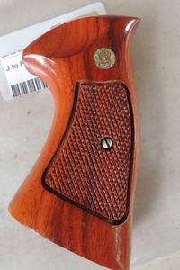 lot 117 image: S&W PISTOL GRIP Wood with Medallion