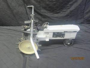lot 23 image: CRAFTSMAN CAST IRON WATER SPRINKLER TRACKTOR&nbsp