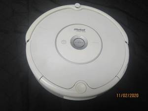lot 135 image: IROBOT ROOMBA 531  POWERS ON (POWER CORD NOT INCLUDED)