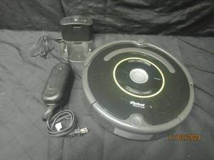 lot 141 image: IROBOT ROOMBA 650 WITH DOCK STATION POWERS ON