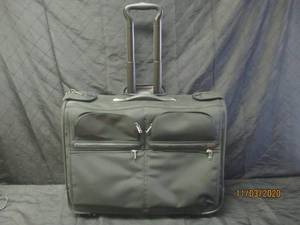 lot 236 image: TUMI SUITCASE WITH WHEELS