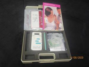 lot 153 image: ALPHA STIM 100 MICROCURRENT SIMULATOR