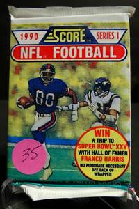 lot 35 image: 1990 Score Football Series 1 Sealed Wax Packs - 16 Cards per Pack MARINOELWAY