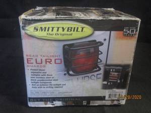 lot 54 image: SMITTYBILT 8660 REAR TAILIGHT EURO GUARDS 1976-2006 WRANGLER BLACK