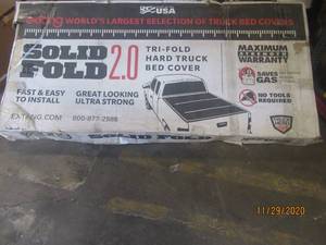 lot 116 image: EXTANG 84455 14-19 ChevyGMC Extang Solid Fold 2.0 Toolbox Bed Cover�(8 Bed)