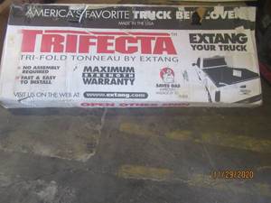 lot 117 image: Extang 94420  09-19 Dodge Ram Extang Trifecta 2.0 Signature Tri-Fold Tonneau Cover�(5.6 Bed)