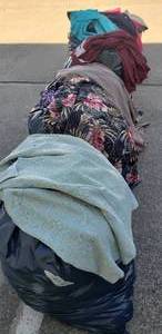 lot 59 image: Large Lot of Assorted Clothes Mostly womens, lightly used and some still with tags (8 Bags Total)