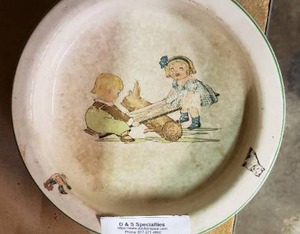 lot 46 image: HoldFast Baby Plate The Taylor Smith and Taylor Co.