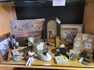 lot 661 image: SOLID BRASS CLIPPER SHIP BOOKENDS, FRAMED DUCK THEMED PRINTS, WOOD FISH HEAN AND TAIL BOOKENDS, PHOTO FRAMES, DUCK BRUSH, BISQUE DUCK FIGURE AND MORE AS SHOWN.