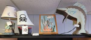lot 663 image: FISHING AND PIRATE THEME LAMPS PLUS FRAMED FISH TILE IN STYLESTHEMES SHOWN.