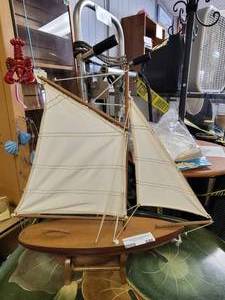 lot 688 image: WOODEN SAILBOAT IN STYLECOLOR SHOWN.