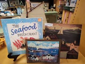 lot 707 image: SEAFOOD RESTAURANT PLAQUE, FRAMED LIGHTHOUSE SCENE PRINTS AS SHOWN.