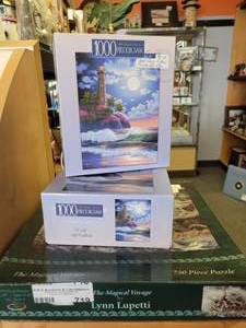 lot 719 image: LOT OF 3 UNOPENED JIGSAW PUZZLES AS SHOWN.