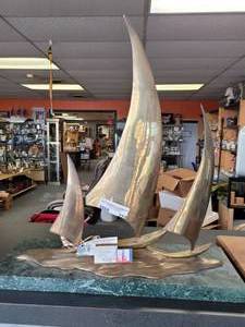 lot 722 image: BRASS SAILBOAT SCULPTURE MOUNTED ON MARBLE BASE. THIS PIECE IS HEAVY.