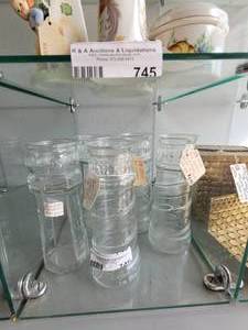 lot 746 image: RED LOBSTER CELEBRATING 35 YEARS GLASS LIGHTHOUSE VASES AS SHOWN. 7.5 HIGH.