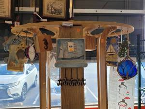 lot 752 image: INDOOROUTDOOR HANGING DECOR, VINTAGE IRIDESCENT VOTIVE SEASHELL HOLDER, CRYSTAL ANGEL FISH MUSIC BOX, VINTAGE HAND BLOWN GLASS ORNAMENT AND MORE AS SHOWN.