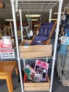 lot 764 image: METALWIRE DISPLAY RACK ON WHEELS WITH CONTENTS AS SHOWN.