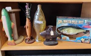 lot 806 image: BIG MOUTH BILLY BASS IN BOX, FISH PAPER TOWEL HOLDER, FISH GLASS BOTTLE, CANDLE HOLDER, VASE AS SHOWN.