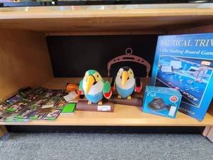 lot 819 image: NAUTICAL TRIVIA BOARD GAME, ORNAMENT, CARDS, AND MORE AS SHOWN.