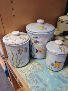 lot 827 image: 3 PIECE CERAMIC CANISTER SET IN STYLEDESIGN SHOWN.