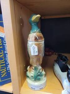 lot 830 image: VINTAGE 1957 C. MILLER DUCK SHAPED DECANTER AS SHOWN.