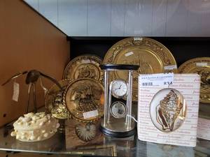 lot 834 image: CRYSTAL GLOBE CLOCK, BRASS PLATES, PEN HOLDER WITH BOX, BRASS CRANE AND MORE AS SHOWN.