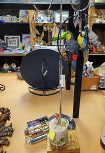 lot 870 image: METAL HOLDER WITH CONTENTS INCLUDING TUCANPARAKEET FIGURINES, CERAMIC TRINKET AND MORE AS SHOWN.