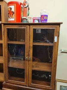 lot 981 image: VINTAGE WOODEN DISPLAY CABINET WITH SHELVES AND GLASS DOORS IN STYLECOLORCONDITION SHOWN. CONTENTS SHOWN NOT INCLUDED
