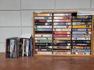 lot 996 image: LOT OF ASSORTED VHS MOVIES IN WOODEN DISPLAY PLUS MOVIE KITS AS SHOWN.
